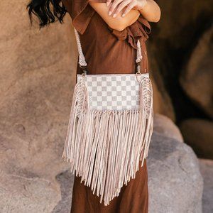 Nomad - Louis Vuitton Pochette with fringe